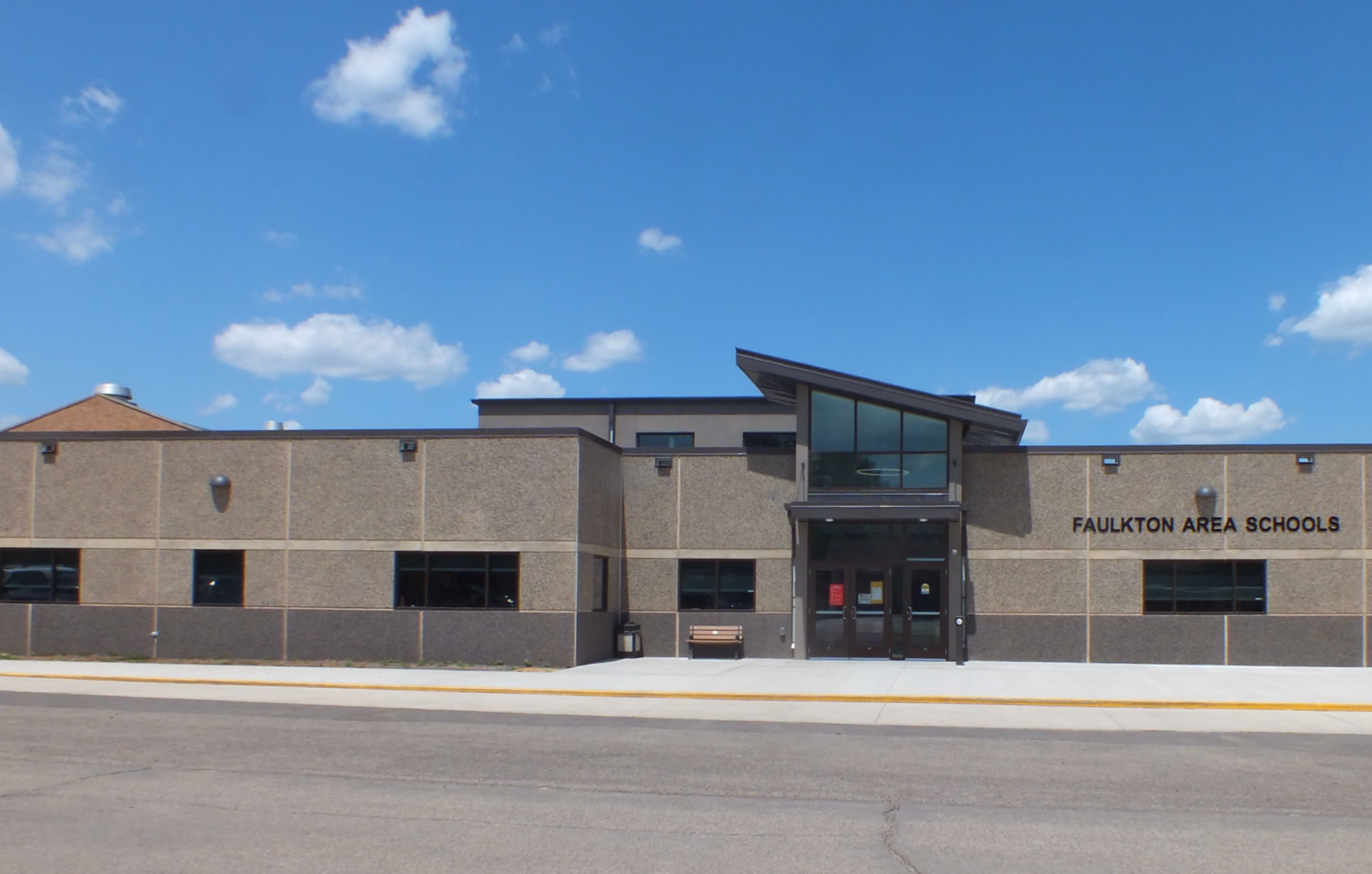 Click the Faulkton Area School District Benefits from New and Remodeled Schools slide photo to open