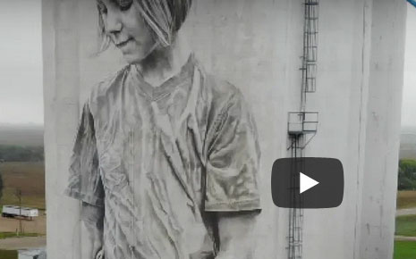 Video Screenshot for Guido Van Helten | Mural Artist | Faulkton SD Silo Painting