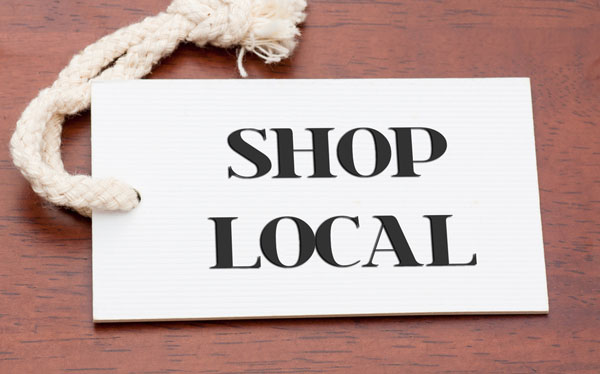 Click the Shop Local This December: Strengthening Redfield’s Economy slide photo to open