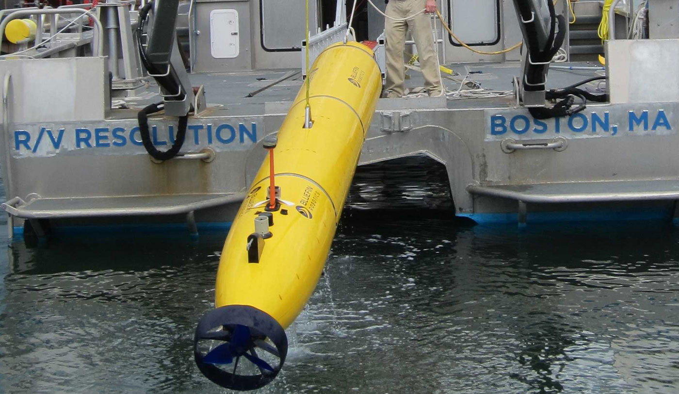 underwater robot being pulled from the water