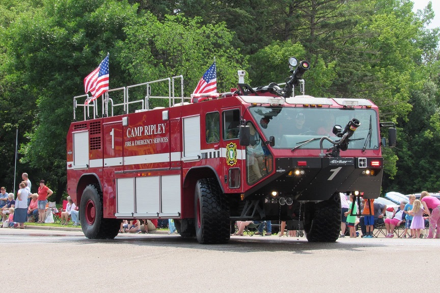 Big truck... bigger smiles, Water-spraying fire truck soaks up the fun at local parades Photo