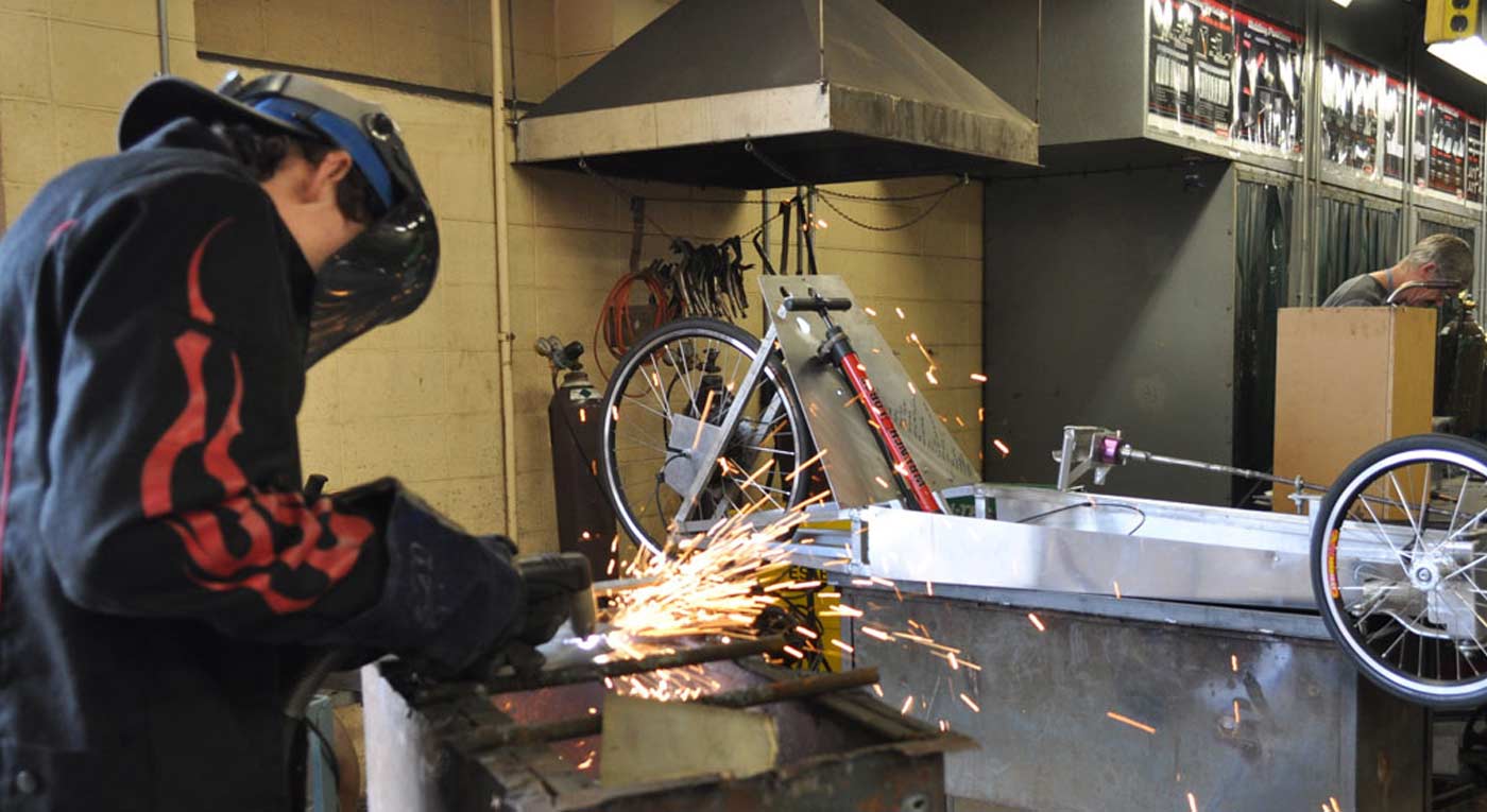 Welder working at a Todd County business