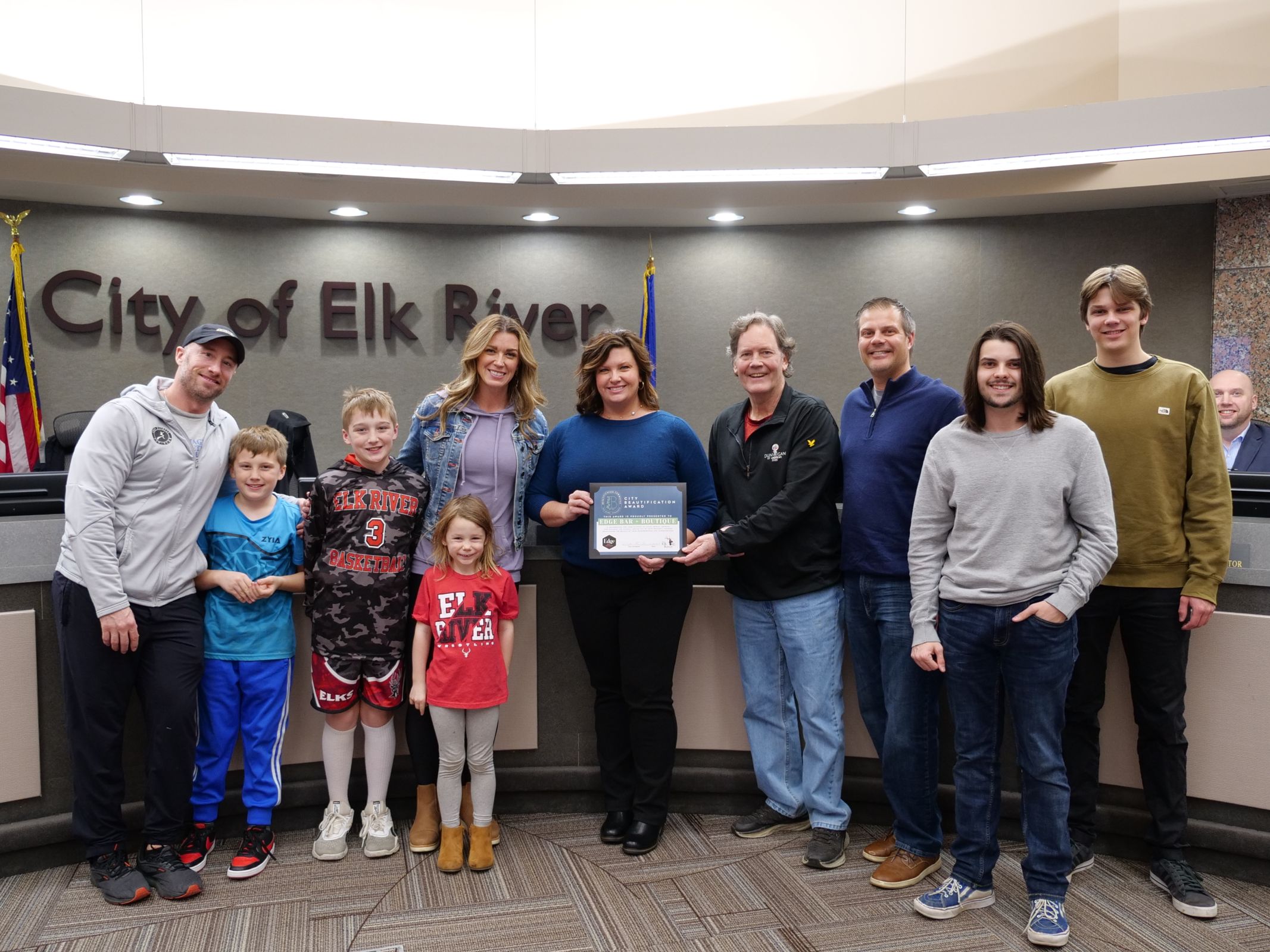 Click the Celebrating Excellence in Community Enhancement: Edge Bar + Boutique: Elk River's 2023 Beautification Award Winner Slide Photo to Open