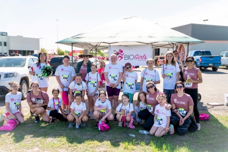 Click the Empowering Adolescent Girls For Every Chapter of Their Tomorrows Slide Photo to Open