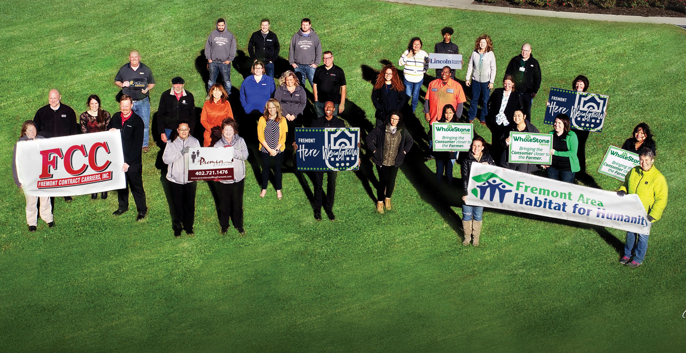 aerial group photo of community business owners