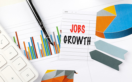 5 Myths About Economic Development Organizations in Greater Springfield Image of Jobs Growth with charts, calculator, pen.
